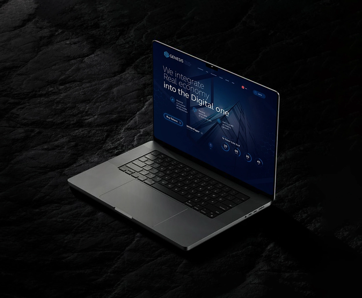 Laptop showcasing GENESIS digital economy platform interface with a futuristic dark-blue UI, symbolizing blockchain integration between real and digital economies.