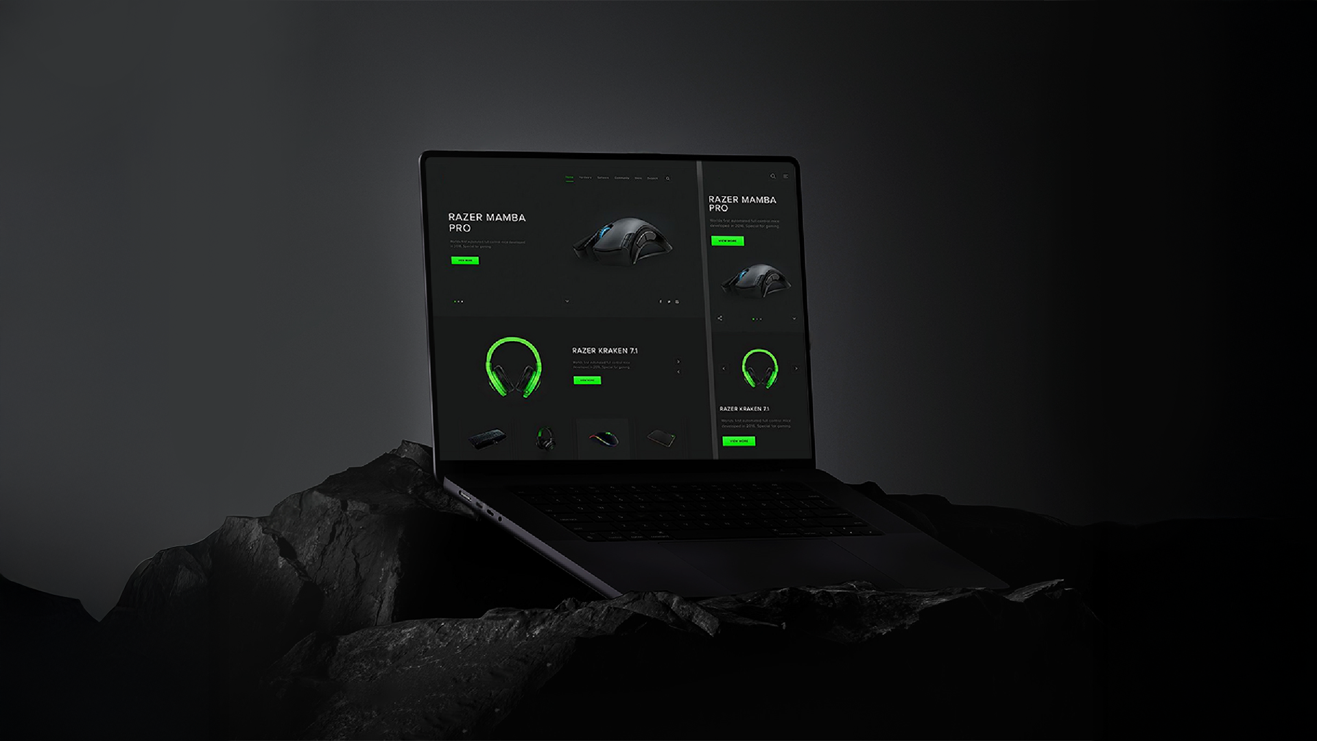 Dark-theme eCommerce website mockup on a laptop featuring Razer gaming products — including the Razer Mamba Pro mouse and Razer Kraken 7.1 headset — showcased on a rocky black background.
